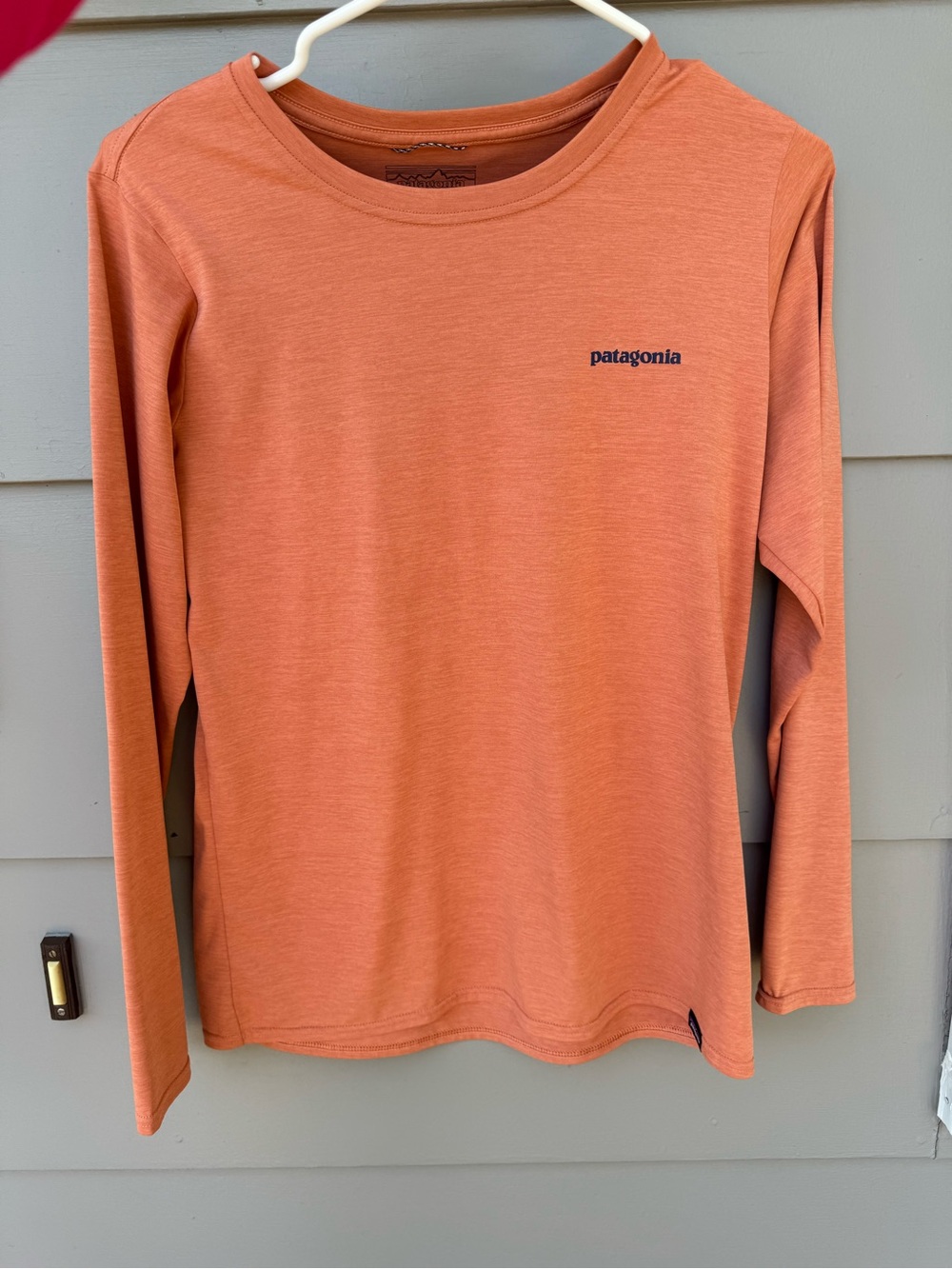 Patagonia Kids Long-Sleeve Tee in Coral Orange
